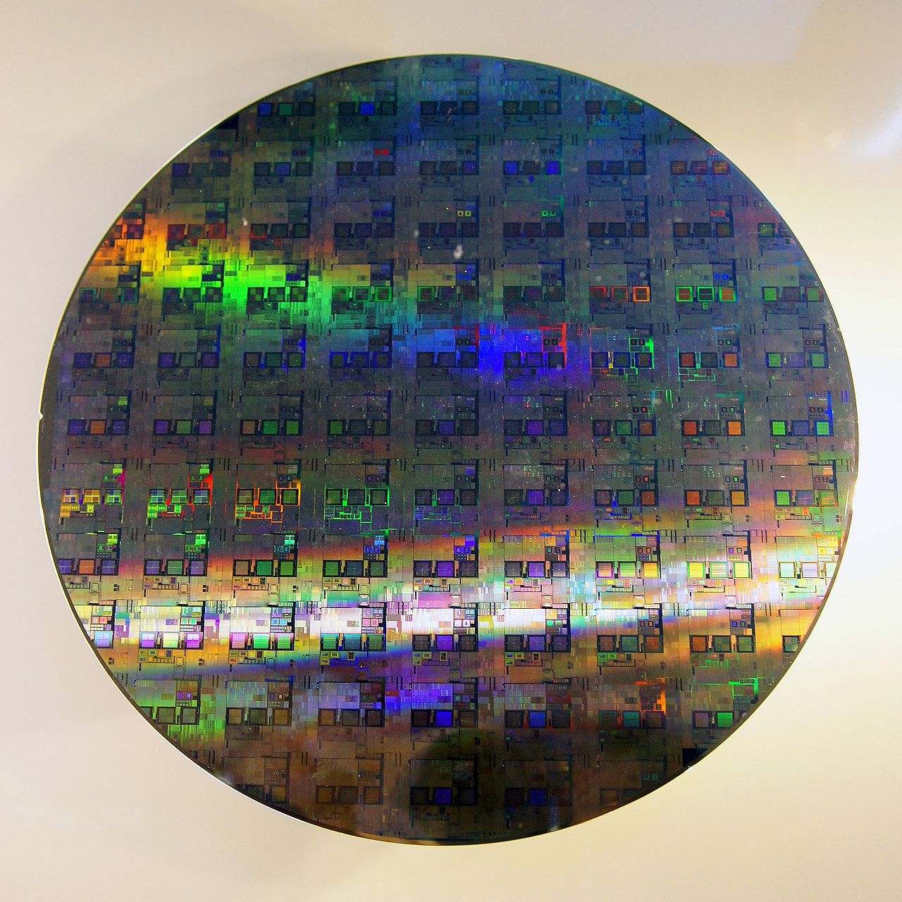 A 12-inch silicon wafer used in semiconductor manufacturing and advanced packaging