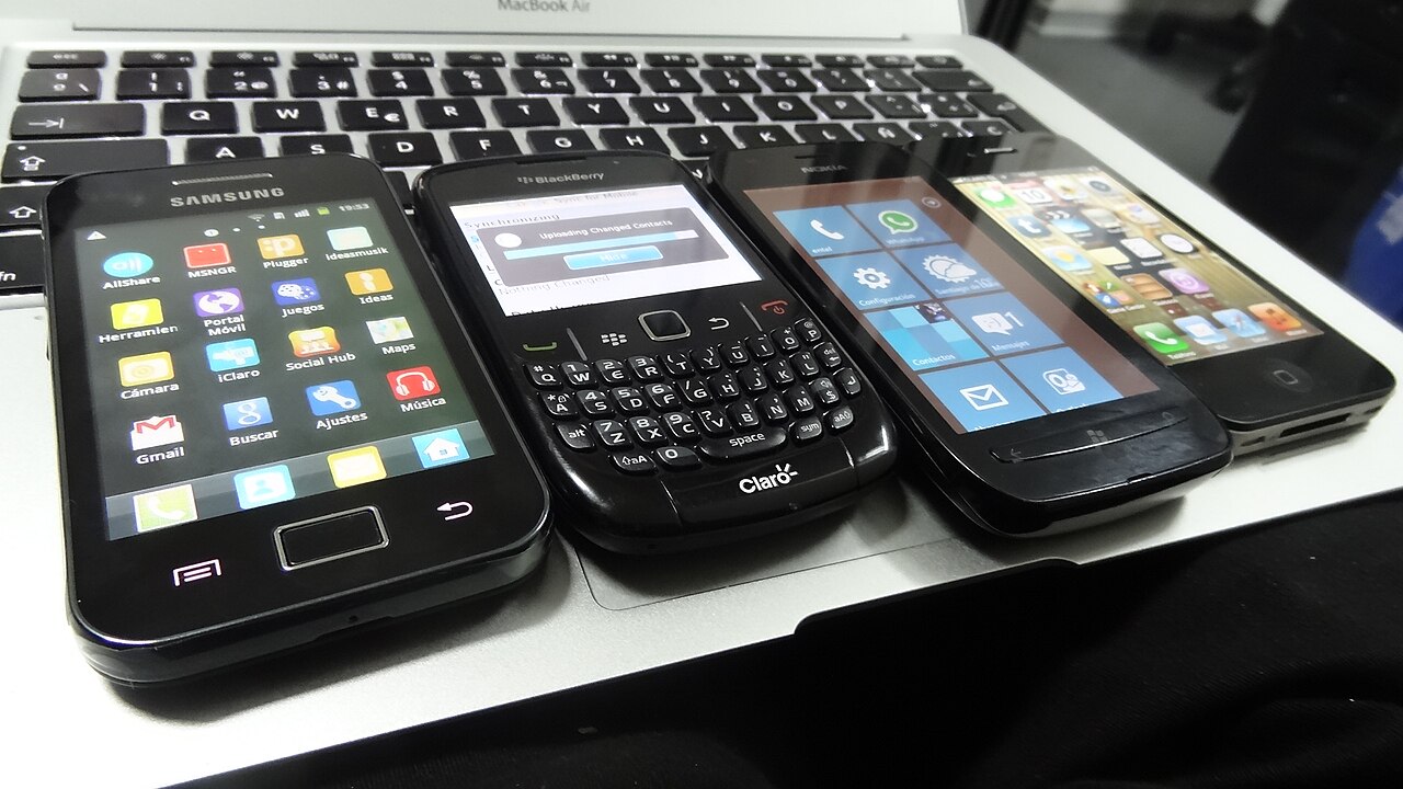 Range of smartphones from Android, BlackBerry, Windows Phone and iOS representing the shrinking 2026 smartphone market
