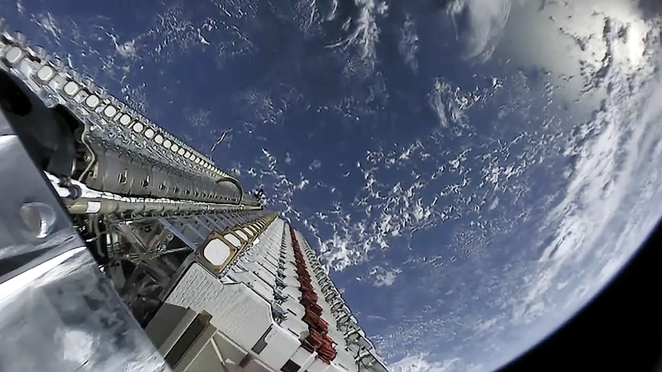 A batch of Starlink satellites being deployed in low-earth orbit, the core of SpaceX revenue